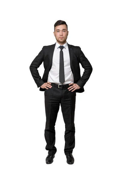 Retrato completo del joven hombre de negocios, ponga sus manos en la cintura, aislado, fondo blanco — Foto de Stock