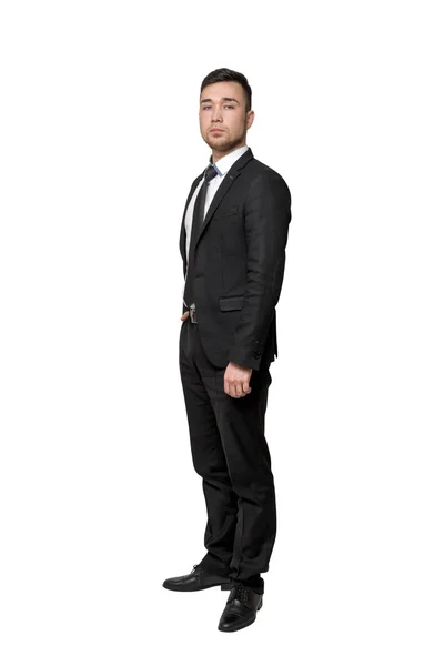 Ritratto completo di giovane uomo d'affari, mettere la mano in tasca, isolato su uno sfondo bianco — Foto Stock