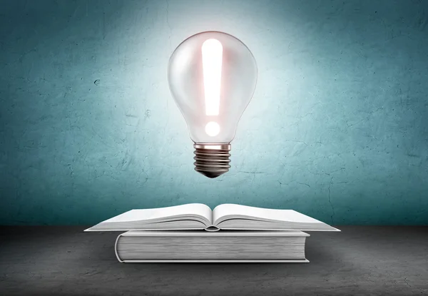 Open book and glowing light bulb with exclamation sign over it. Knowledge, education concept — Stock Photo, Image