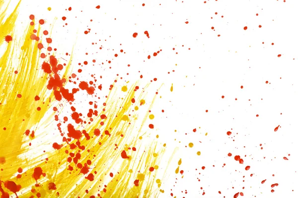 Cross shaped strokes with yellow and red gouache forming spots on a white canvas — Stock Photo, Image