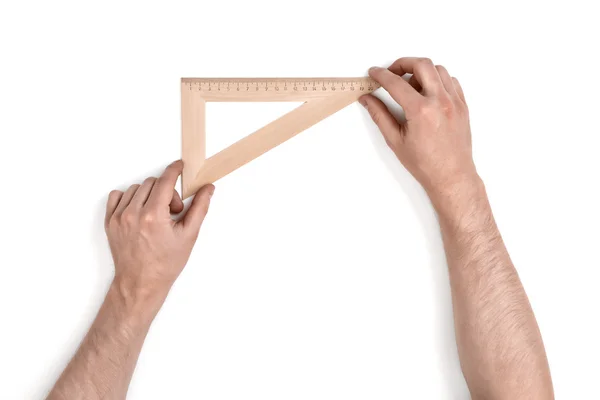 Hombre sosteniendo un conjunto de madera cuadrado —  Fotos de Stock