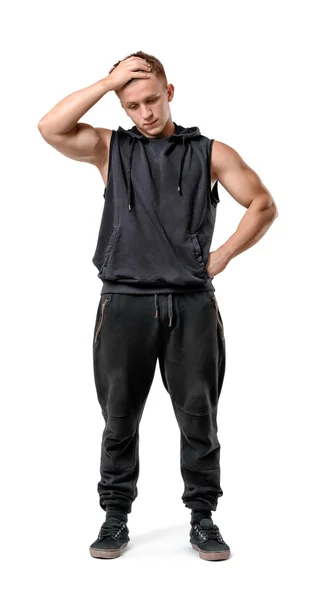 Ganzkörperporträt eines gutaussehenden muskulösen jungen Mannes, der isoliert auf weißem Hintergrund denkt — Stockfoto
