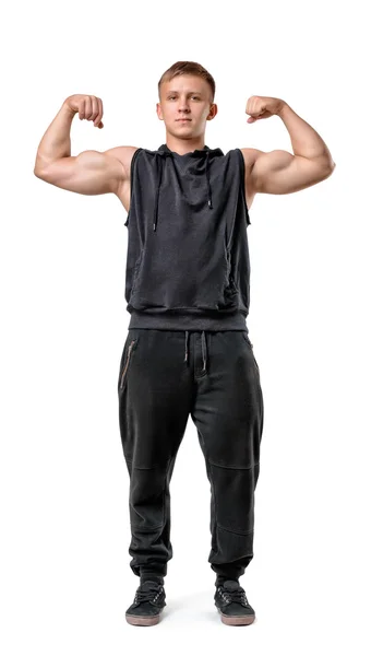 Muž s svalové svaly, ukazující biceps — Stock fotografie