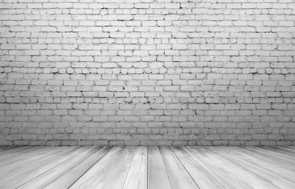 Stará bílá cihlová stěna a dřevěná podlaha — Stock fotografie