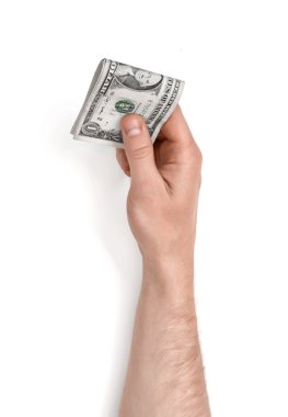 Görünümü kadar yakın bir beyaz arka plan üzerinde izole bir dolar faturaları tutan el mans