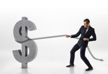 Beyaz arka plan üzerinde izole bir ip ile büyük beton 3d dolar işareti çekerek İşadamı