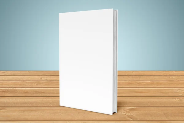 Livro em branco branco sobre pranchas de madeira — Fotografia de Stock