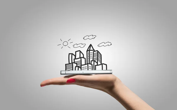 Drawing skyscrapers on hand — Stock Photo, Image