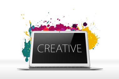 Open laptop with splatters