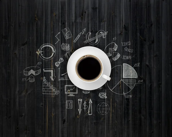 Table covered with drawings and a cup of coffee — Stockfoto