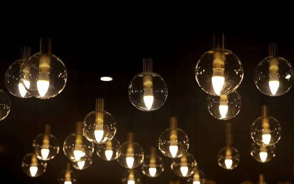 Lâmpadas Brilhantes Uma Sala Escura Para Luz Fundo Publicidade — Fotografia de Stock