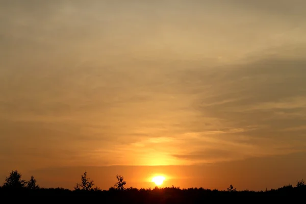 Foto puesta del sol cielo — Foto de Stock