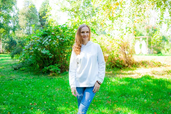 Young Blonde White Hoodie Jeans Autumn Park Sunny Day Street — Stock Photo, Image