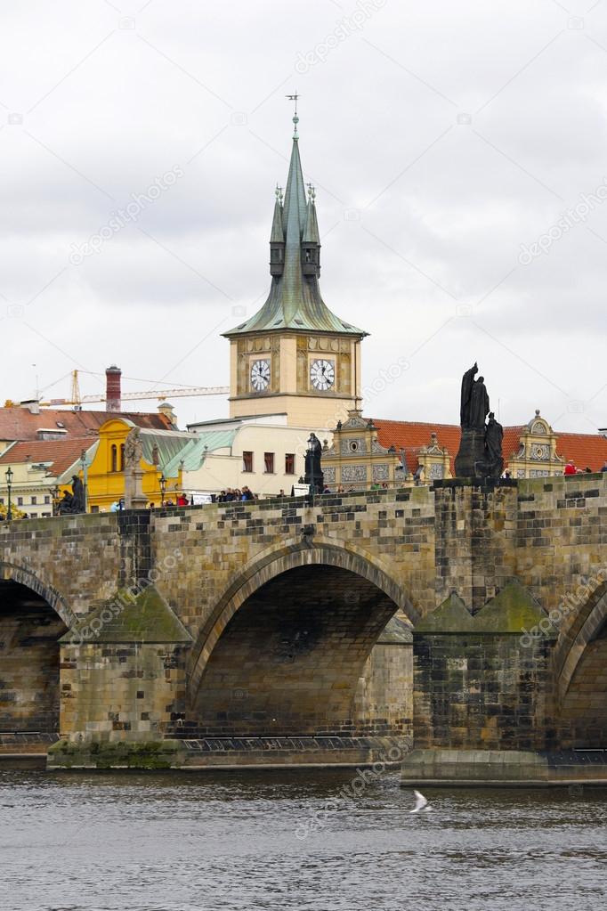 Pedestrians only Charles Bridge (a.k.a. Stone Bridge, Kamenny most, Prague Bridge, Prazhski most) over Vltava river in Prague,