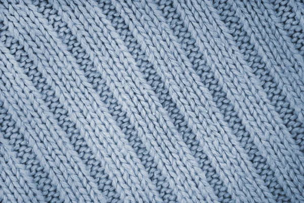 Детали вязаной голубой текстуры свитера из шерсти — стоковое фото