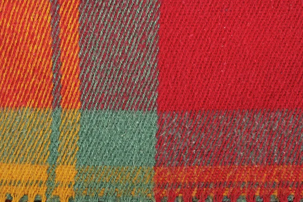 Rouge, jaune, vert, texture de laine à carreaux colorés, fond — Photo