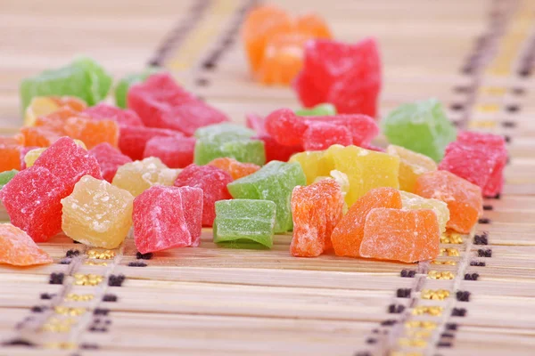 Fruit candy colorful all sorts, on a wooden background — Stock Photo, Image