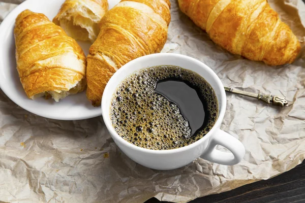 Cup of espresso with croissants — Stock Photo, Image
