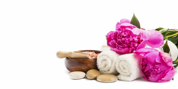 Spa peonies flowers with towels and stones — Stock Photo, Image