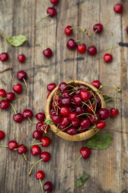 Cherry organic berries harvest. Fresh cherries for jam, juice, smoothie, compote, desserts and cakes. Organic fruits in the village
