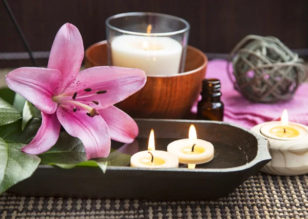 Spa Floating Burning Candles and Lilies — Stock Photo, Image