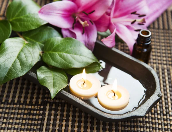 Spa Floating Burning Candles and Lilies — Stock Photo, Image