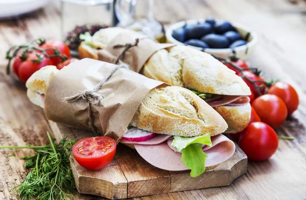 Ciabatta Sandwiches with Mortadella Ham, Lettuce and Radish Slic — Stock Photo, Image