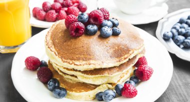 Breakfast.Honey Pancakes with Blueberries and Raspberries,Coffee