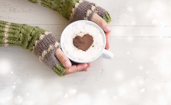 Holding Coffee Latte with Cozy Hand Warmers on Magic Background — Stock Photo, Image