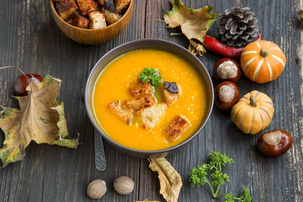 Fall Pumpkin Soup with Croutons and Parsley — Stock Photo, Image