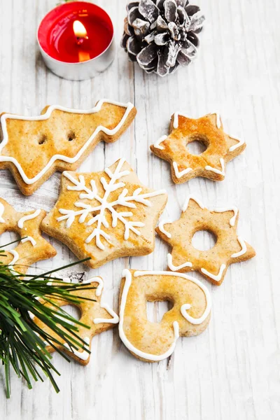 Christmas Gingerbread Cookies with Ornaments on Wooden Board — Stock Photo, Image