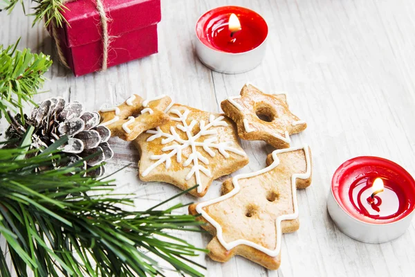 Christmas Gingerbread Cookies with Ornaments on Wooden Board — Stock Photo, Image