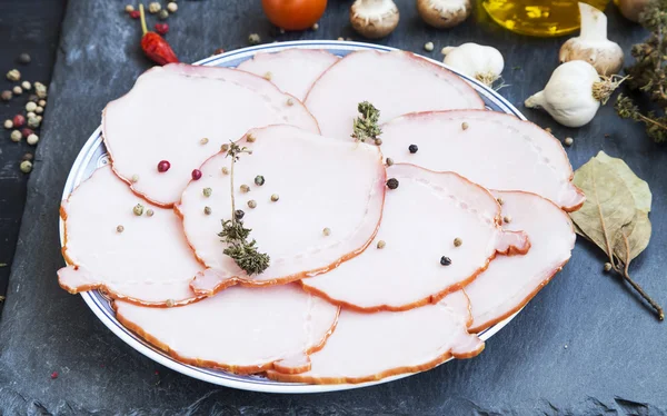 Pork ham slices with spices — Stock Photo, Image