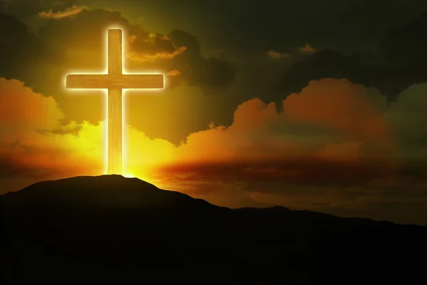 Glowing cross on  the hill — Stock Photo, Image