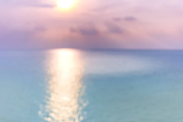 Dream blur sea sunset sunrise. Endless horizon, relaxing, calmness, peaceful nature pattern. Magical majestic ocean water, sun reflection, sparkling blue water, colorful sky