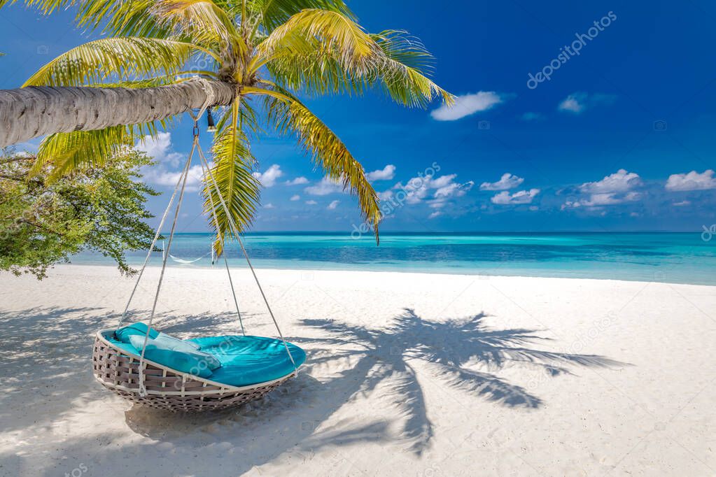 Tropical beach background as summer landscape with beach swing or hammock and white sand and calm sea for beach banner. Luxury travel landscape, beach scene vacation and summer holiday concept. Boost up color process