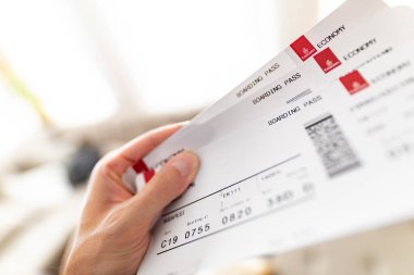 14.12.19, Dubai, Emirates, UAE: Boarding pass on the hand. Emirates flying ticket. Travel, vacation, business trip