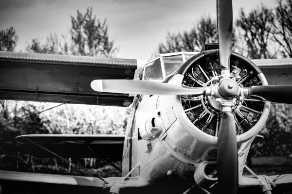 Duster airplane on airfield. Old aircraft close up, rotor, engine.