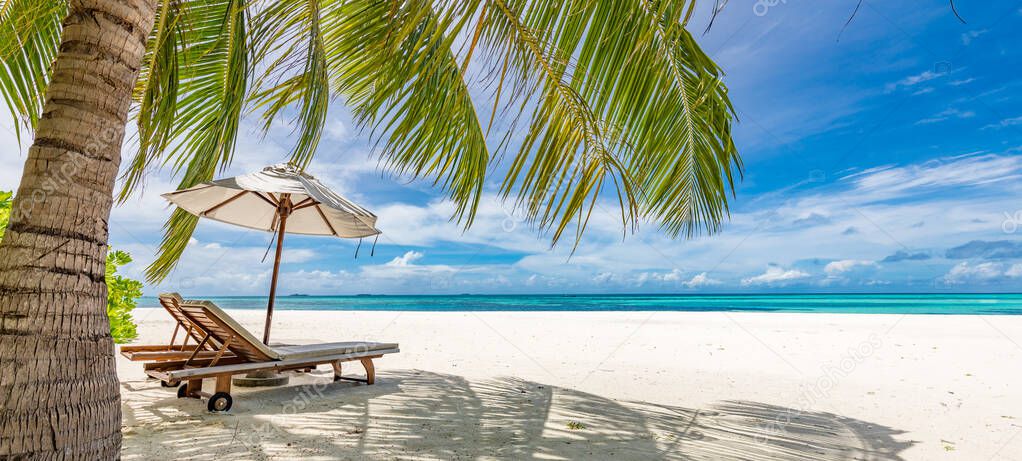 Tranquil beach scene. Exotic tropical beach landscape for background or wallpaper. Design of summer vacation holiday concept. Perfect couple travel destination landscape, summer vacation holiday template. White sand, chairs, leisure lifestyle