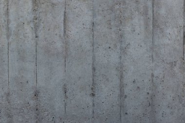 Güçlendirilmiş beton arka plan. Eski ve kirli beton yüzeyinde ahşap döşeme izleri var..