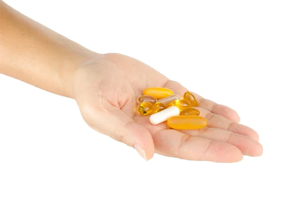 Vitamin i kvinnans hand — Stockfoto