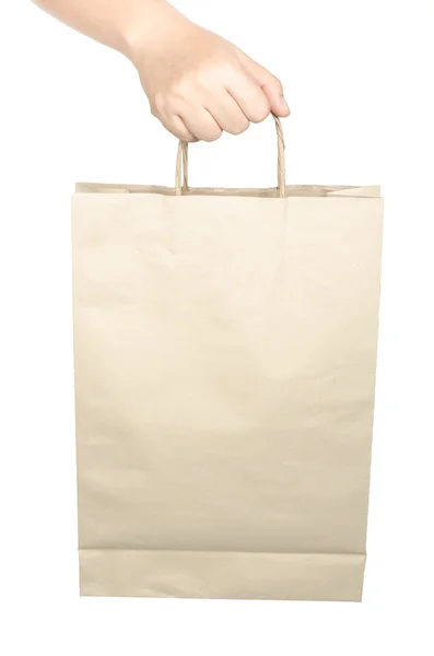 Hand holding paper bag — Stock Photo, Image