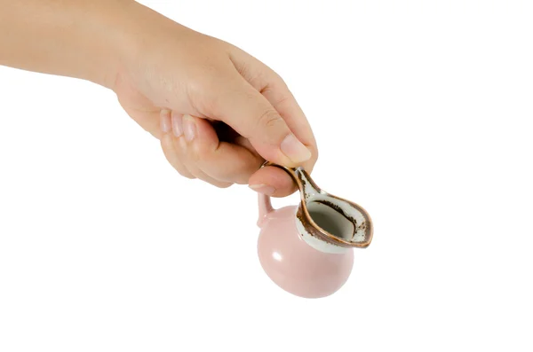 Hand with mini jug — Stock Photo, Image