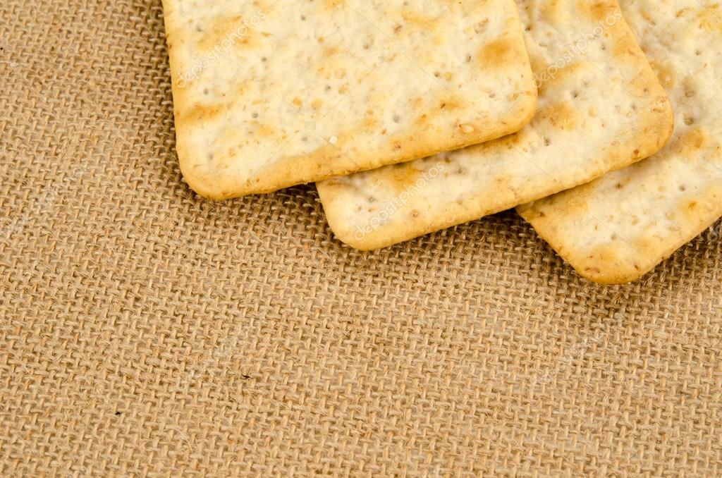 image of saltine crackers on brown sack background — 图库照片#5