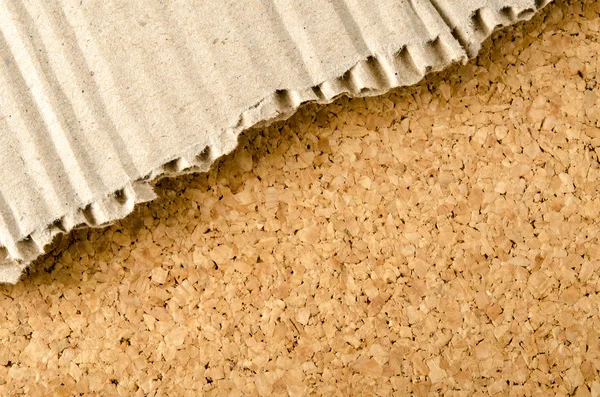 Brown Corrugated paper on cork background