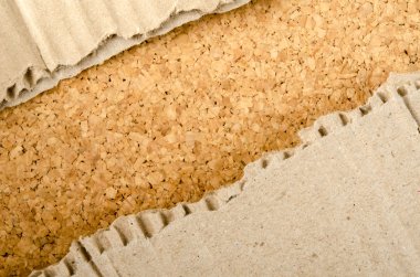 Cork arka plan üzerinde Brown oluklu kağıt