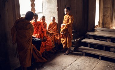Unidentified Buddhist monks in Angkor Wat complex clipart