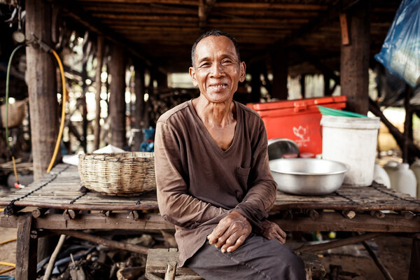 Portrait of an unidentified asian man on Tonle Sap Lake