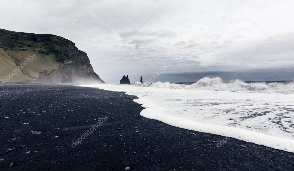 The black sand beach of Reynisfjara and the mount Reynisfjall