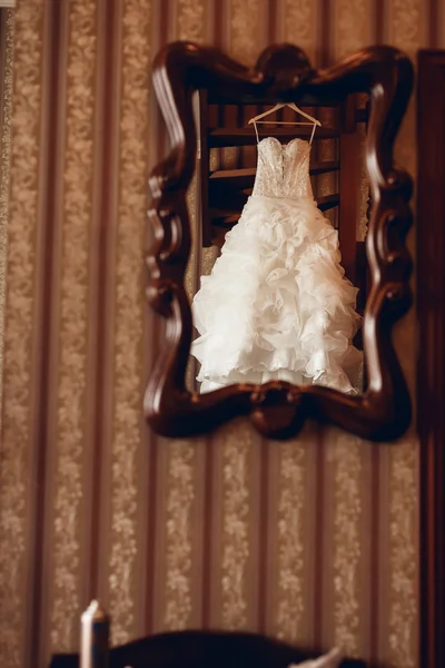 Wedding dress in mirror — Stock Photo, Image